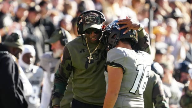 Deion Sanders with Alejandro Mata at Folsom Field
